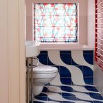 small bathroom with blue floor tiles