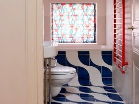 small bathroom with blue floor tiles